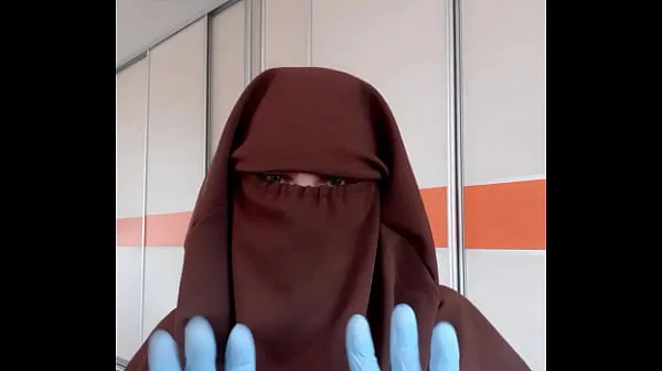 Nowe Housekeeper trying on hijab in front of a mirror fajne filmy